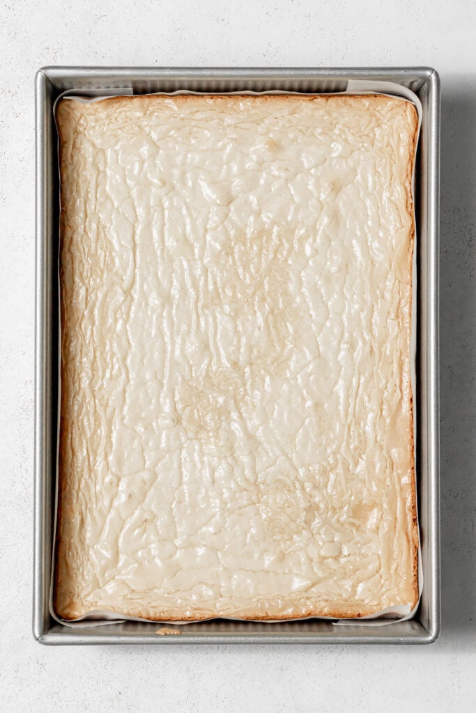 baked white chocolate brownies in pan.