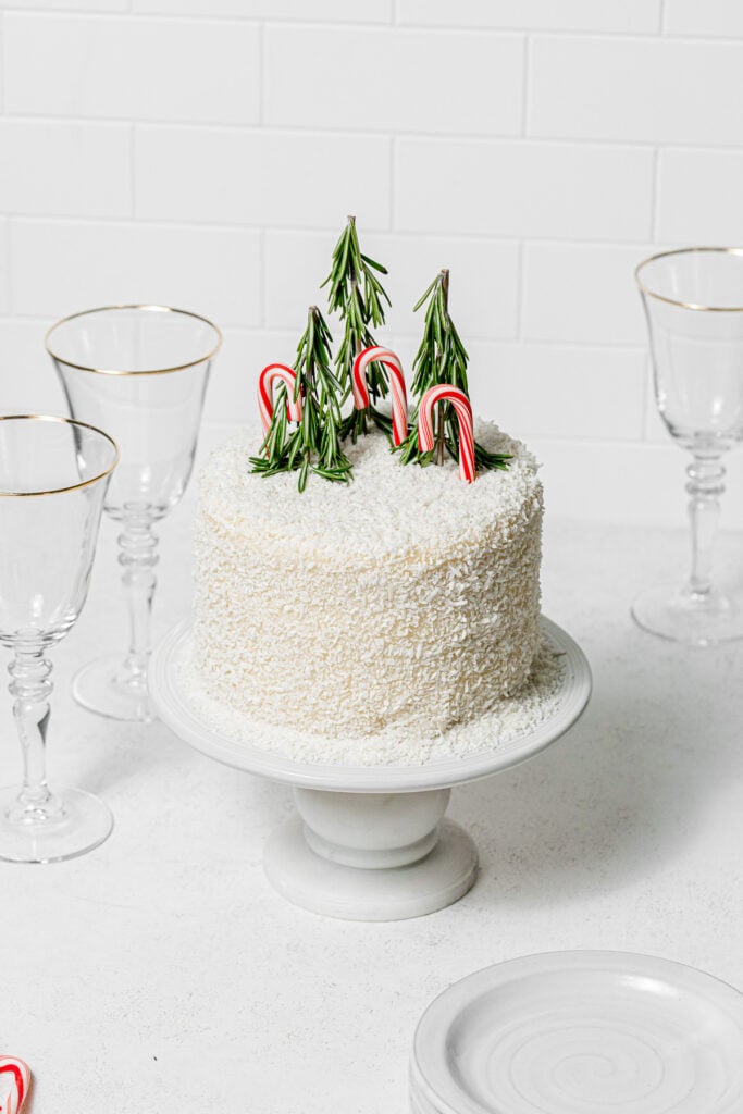 Coconut Snowball Cake on cake stand.