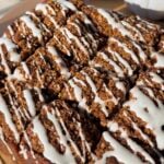 Glazed Apple Coffee Cake cut into square pieces.