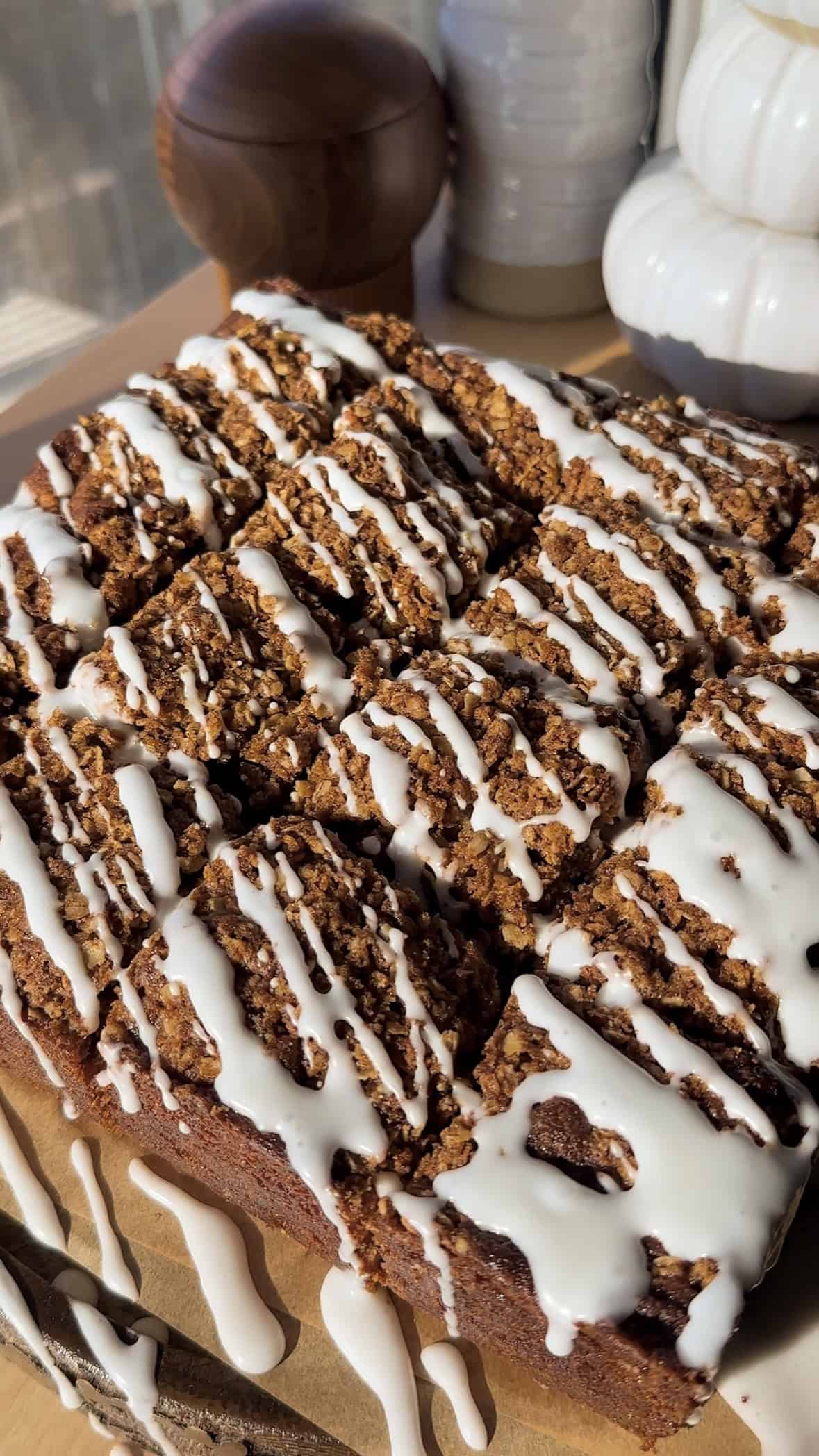 Glazed Apple Coffee Cake cut into square pieces.
