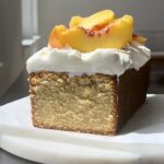 Peach Shortcake Cake on marble round.