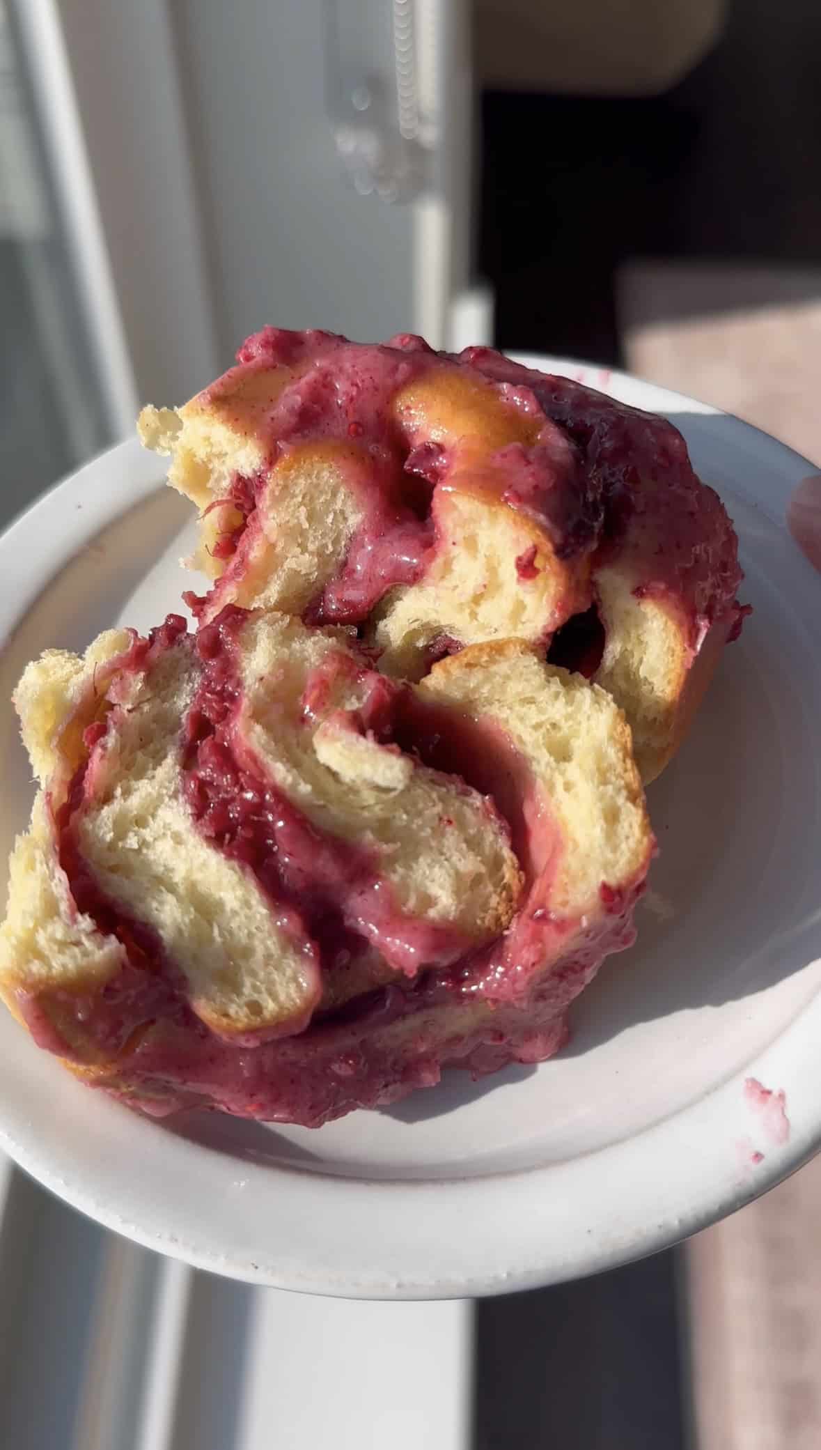 Roasted Raspberry Sweet Roll cut in half.