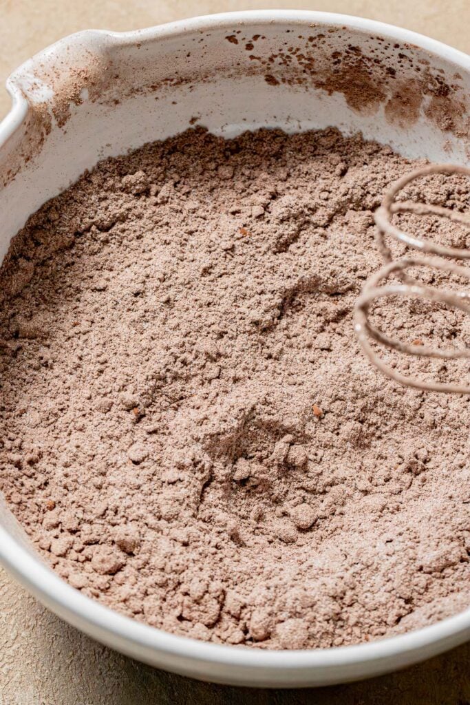 butter mixed into dry ingredients in bowl.