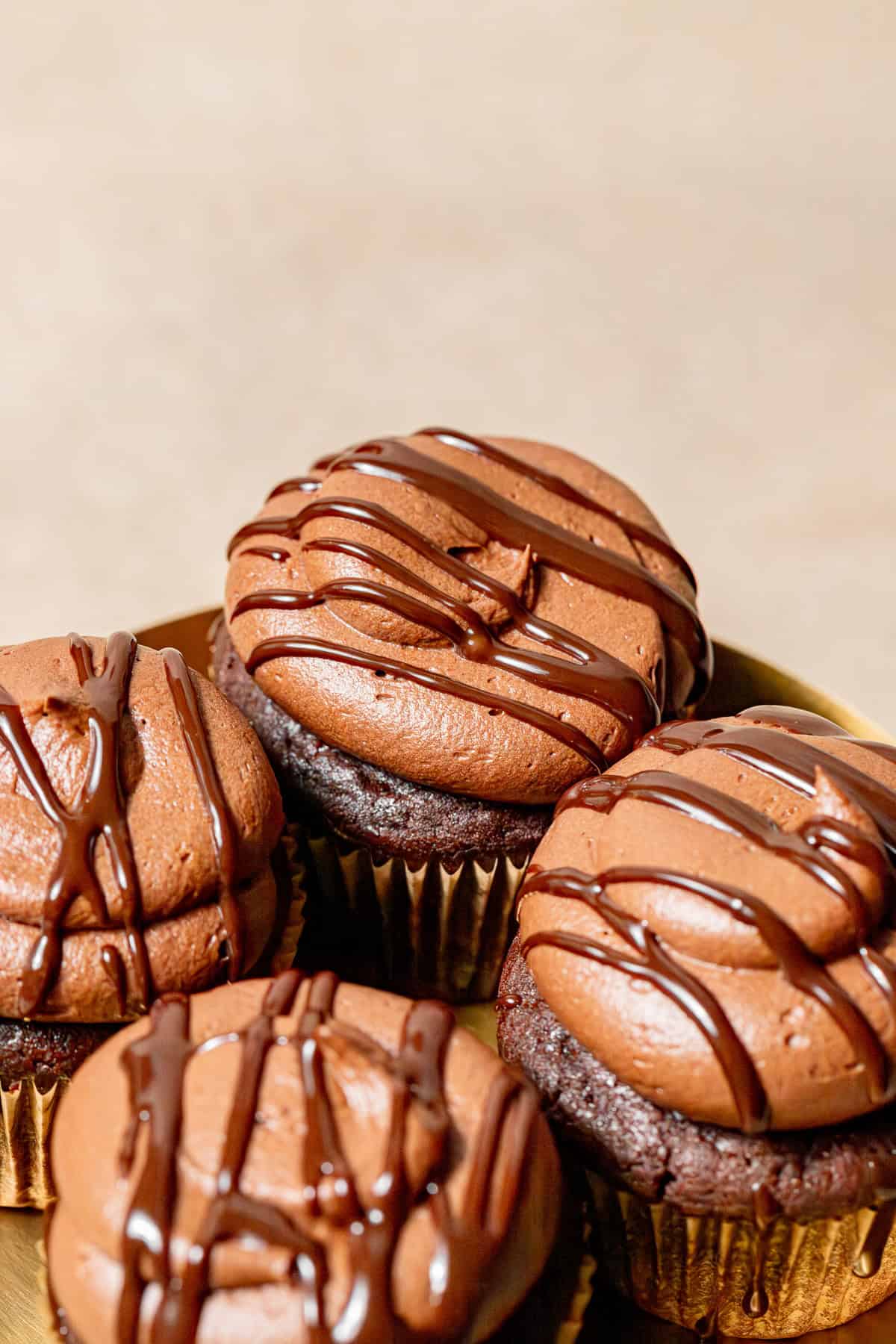Chocolate Ganache Cupcakes on stand.