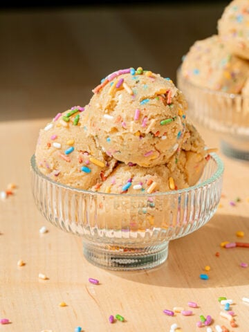 edible cookie dough in glass cup.