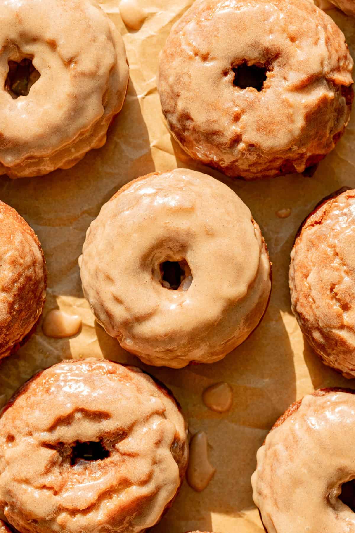 Old-Fashioned Banana Bread Donuts on baking sheet.