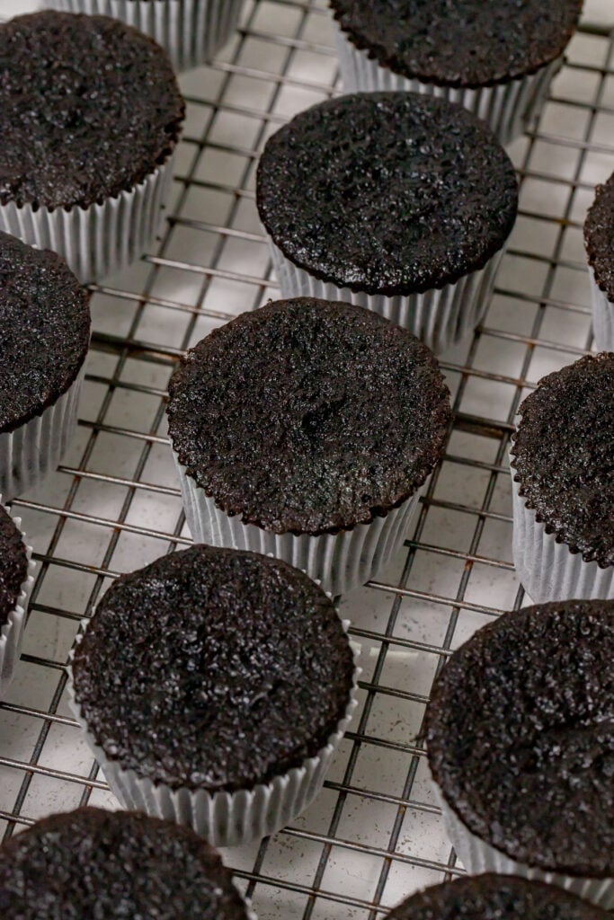 baked cupcakes on wire rack.