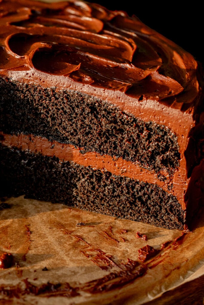 chocolate ganache cake cut to reveal inside texture.