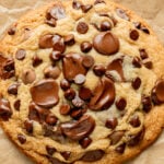 single serve chocolate chip cookie on parchment paper.