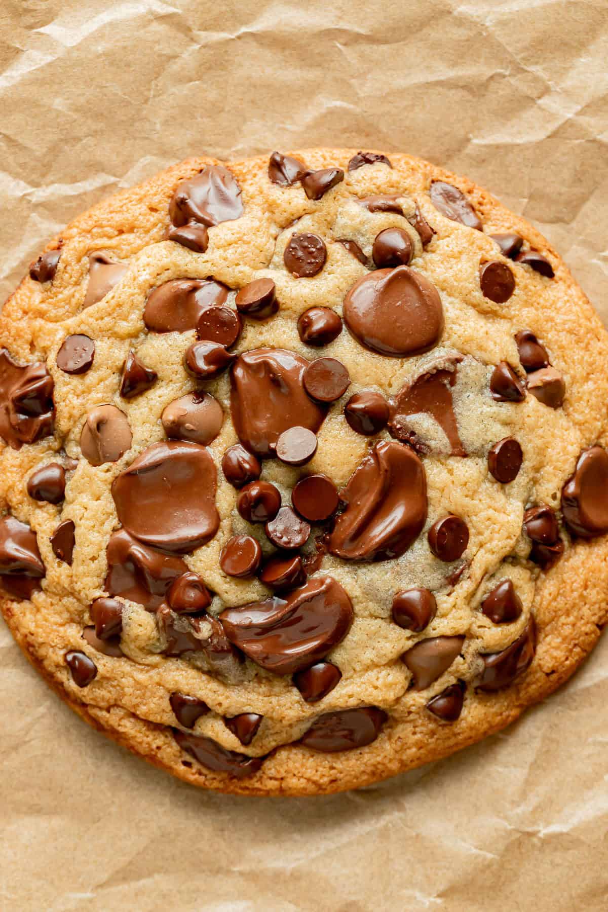 single serve chocolate chip cookie on parchment paper.