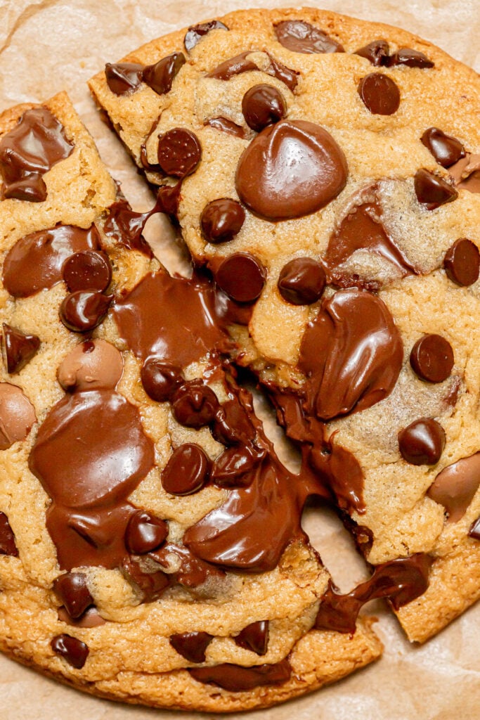 single serve chocolate chip cookie cut in half.