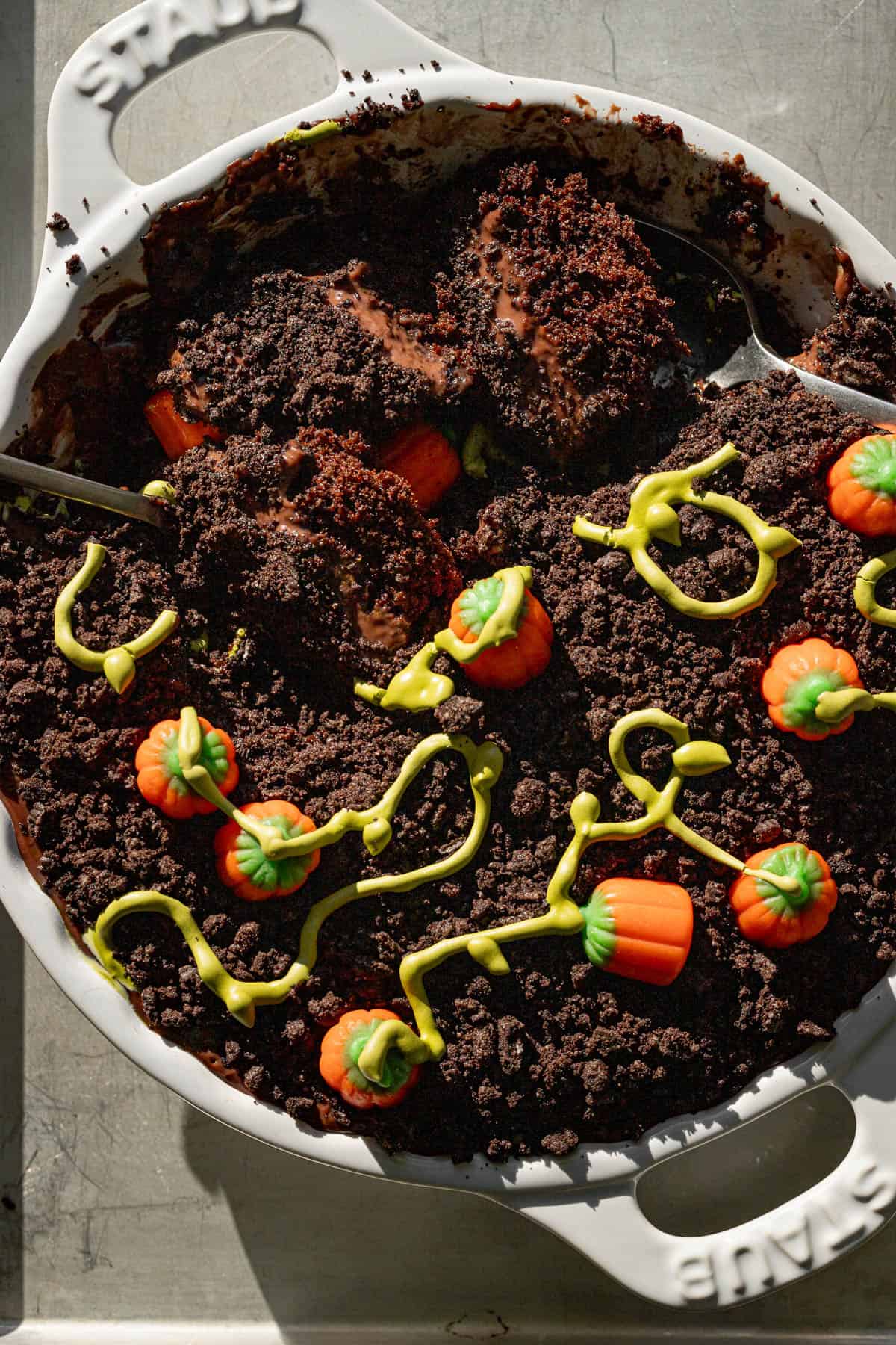 two spoons dug into dirt pudding cake.