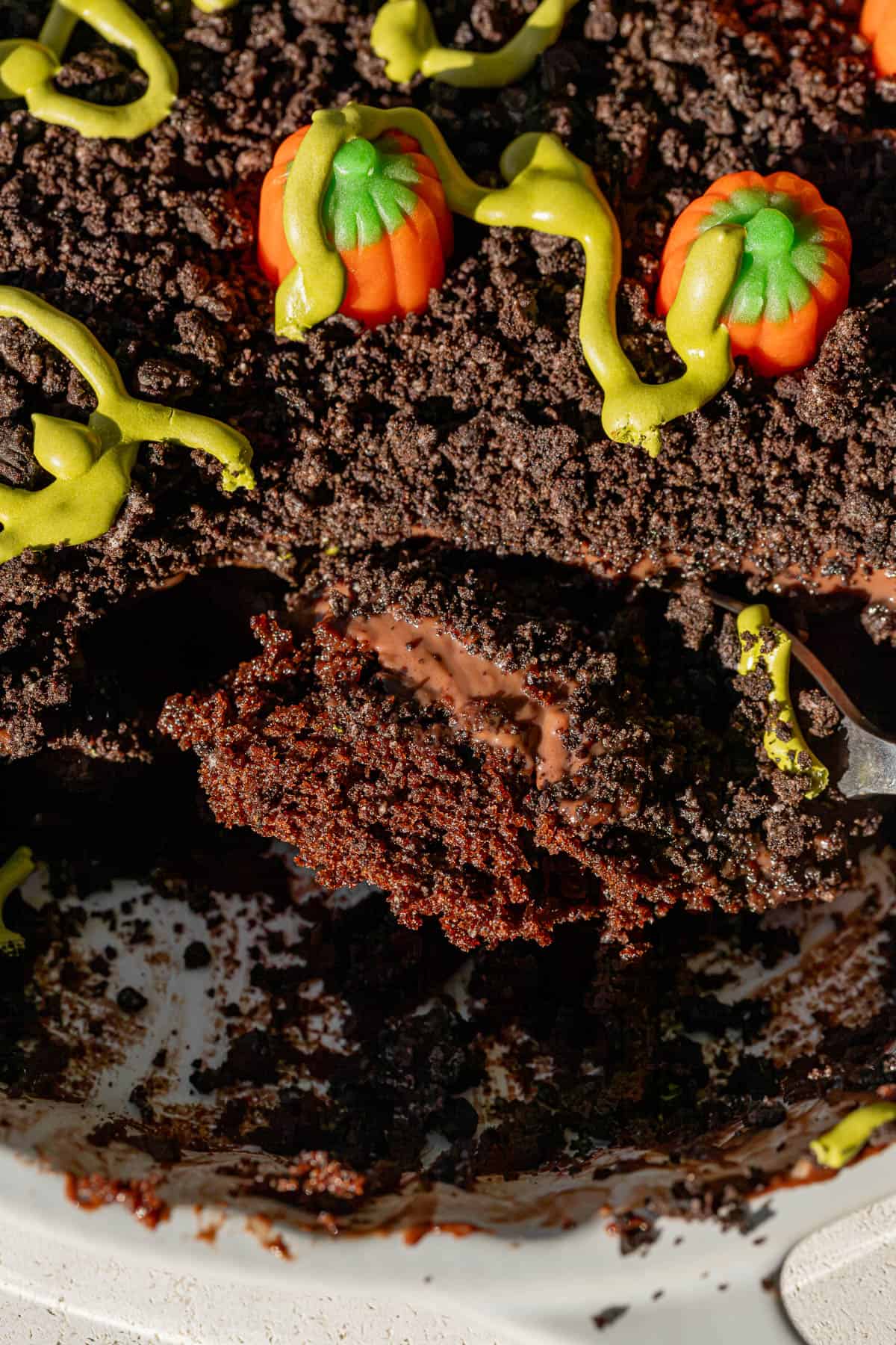 spoon scooped into dirt pudding cake.
