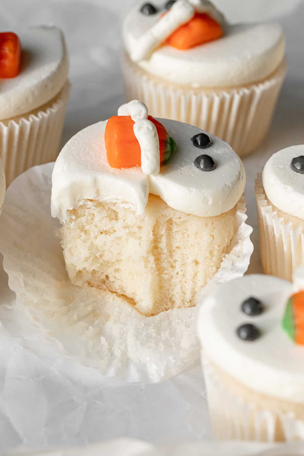 bite taken out of White Ghost Cupcake.