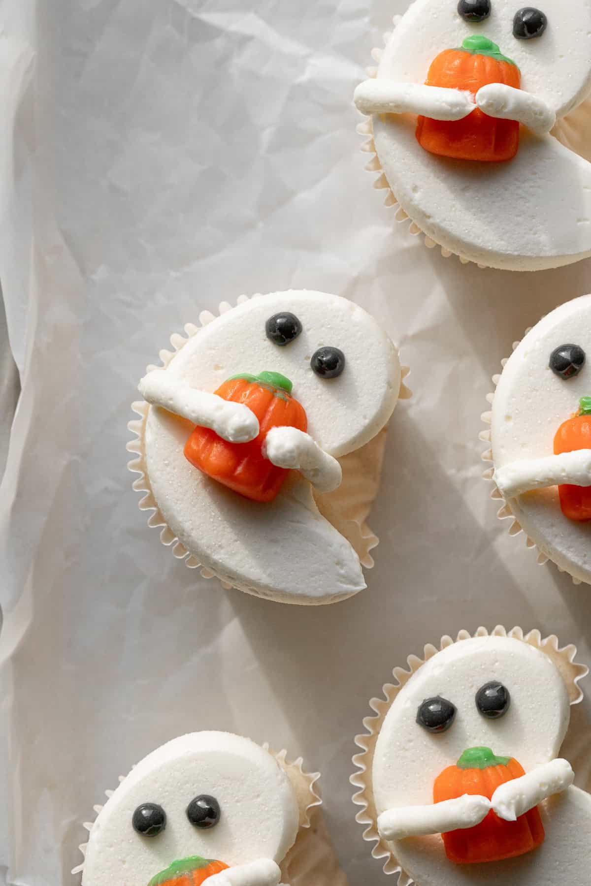 White Ghost Cupcake on baking sheet.